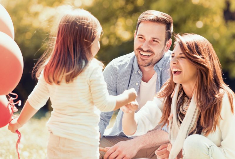 young happy family smiling together